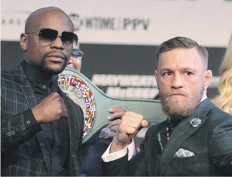  ?? JOHN GURZINSKI/AFP/GETTY IMAGES ?? When Floyd Mayweather, left, fights Connor McGregor Saturday, it’ll be just the latest low-risk bout of his career.