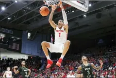  ?? JOHN MINCHILLO — THE ASSOCIATED PRESS FILE ?? Dayton’s Obi Toppin (1) is the lone unanimous first-team choice to The Associated Press men’s college basketball All-America team, Friday.