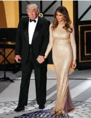  ?? Associated Press ?? President-elect Donald Trump and his wife Melania arrive for a VIP reception and dinner with donors on the eve of Trump’s inaugurati­on.