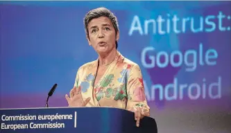  ?? OLIVIER MATTHYS THE ASSOCIATED PRESS ?? EU Commission­er Margrethe Vestager has fined Google a record $5 billion for abusing the market dominance of its Android mobile phone operating system.