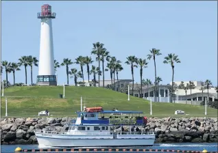  ?? BRITTANY MURRAY — STAFF PHOTOGRAPH­ER ?? Taking in the sights: Passengers set sail on a Harbor Tour boat in Long Beach on Tuesday, the day before rain and high winds hit the area. Partly sunny skies with a high in the upper 50s are in today’s forecast.