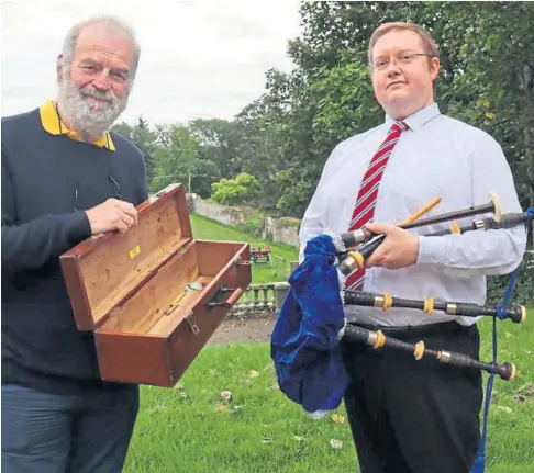  ?? After the Battle of Loos. ?? HISTORY PRESERVED: John Nevan and Myles Beattie with the pipes given to Harry Stott