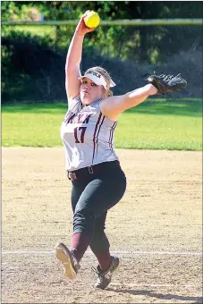  ?? RANDY MOLL NWA MEDIA ?? Lincoln junior Aayden Massey winds up before delivering a pitch. Massey was named to the All-Tournament Team for State 4A softball. She pitched a strong game in the Lady Wolves’ 1-0 loss to Heber Springs.