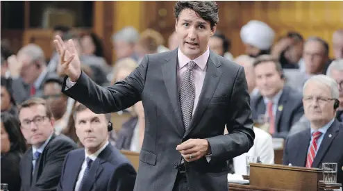  ?? ADRIAN WYLD / THE CANADIAN PRESS ?? Prime Minister Justin Trudeau rises during question period in the House of Commons on Tuesday. The Trudeau Liberals have been diminished by tax reform proposals on private corporatio­ns outlined during the summer.