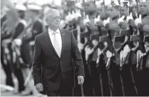  ?? AP PHOTO BY ERALDO PERES ?? U.S. Secretary of Defense Jim Mattis receives military honors before his meeting with Brazil’s defense minister, in Brasilia, Brazil, on Monday.