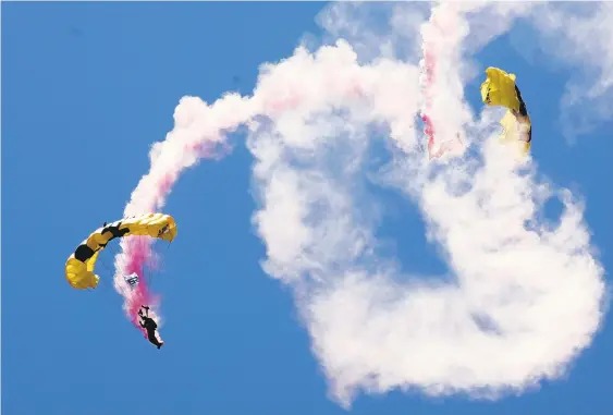  ?? LYNNE SLADKY / ASSOCIATED PRESS ?? The U.S. Army parachute team, the Golden Knights, will be among the performers at The Great Pocono Raceway Air Show on Aug. 24-25.