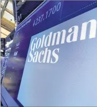  ?? AP PHOTO ?? In this Dec. 13, 2016, file photo, the logo for Goldman Sachs appears above a trading post on the floor of the New York Stock Exchange.