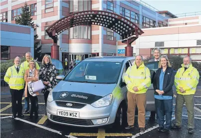  ??  ?? A volunteer-led patient transport service has been launched in Fife. From left: Lawson Rennie of St John Scotland Fife, volunteer driver Chris Cooke, volunteer driving assistant Caitlyn Dudgeon, clinical nurse manager Louise McNeill, volunteer driver...