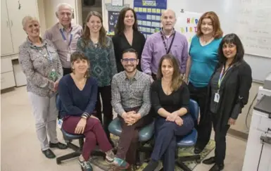  ??  ?? Kathy Anderson, back left, Georges Mazzawi, Miriam Riches, Sharlene Bourjot, John Gibson, Patti Ryan, Jyoti Sanwalka, Julie Birrell, front left, Peter Lazarakis and Mary Belkas are teachers at the Hospital for Sick Children.