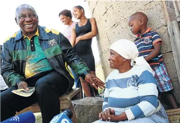  ?? /Sunday Times ?? Plenty: Deputy President Cyril Ramaphosa visits Eunice Mthembu during an ANC campaign in Nquthu in April. On Sunday, Ramaphosa said economic transforma­tion should not ‘enrich the few’ but should lead to inclusive growth for all South Africans.