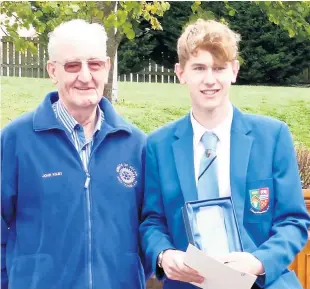  ?? ?? Award
Cameron is pictured with John Kilby, the rotary club’s youth community officer
