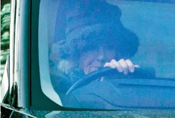  ?? ?? Glum: Camilla, Queen Consort, drives near Birkhall in Aberdeensh­ire yesterday