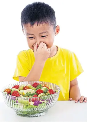  ?? DREAMSTIME ?? Author Virginia Smith-Sole says kids shouldn’t be forced to eat their veggies or clean their plate.