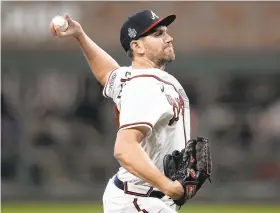  ?? ASHLEY LANDIS/AP ?? Braves pitcher Dylan Lee threw just 15 pitches in his first major league start Saturday in Game 4 of the World Series. He gave up one hit and one run.