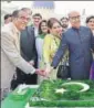  ?? PTI ?? Pakistan high commission­er Abdul Basit and wife Summiya cut a cake on Pakistan Day in New Delhi on Thursday.