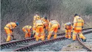  ??  ?? Right: Potential new rail workers undergoing training by EYE Global at Cynheidre. LMMR