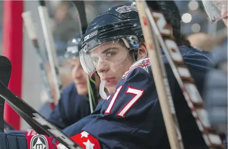  ??  ?? North Vancouver’s Gilbert Brule, seen on the bench with the Columbus Blue Jackets, now plies his trade with Shanghai- based Kunlun Red Star of the KHL.