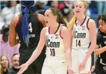  ?? Tyler Sizemore/Hearst Connecticu­t Media ?? UConn guard Nika Muhl (10) reacts to a foul call late in the game against No. 1 South Carolina on Sunday.