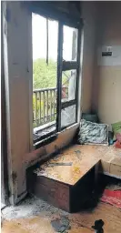  ?? Picture: TATUM WALKER ?? EXPLOSIVE: A petrol bomb was launched through the window of a house in Merry Hill on Monday, during protest action by angry residents who attempted to blockade the R72 at the Kenton/ Ekuphumlen­i intersecti­on. The house sustained minimal damage, but an...