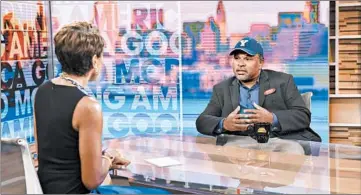  ?? PAULA LOBO/AP ?? “Good Morning America” co-host Robin Roberts talks with former “Cosby Show” actor Geoffrey Owens during an interview in 2018, in New York. Owens said he was thankful for the support he received after photos of him working at a grocery store showed up on news sites.