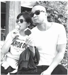  ??  ?? Film producer Neil Arce posted this photo with Angel Locsin as the latter celebrated her birthday on Sunday, April 23. (Photo taken from Arce's Instagram account)