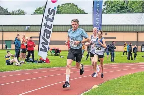  ?? ?? Grassroots Olympian Andrew Butchart ran as a pacemaker at the popular event