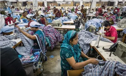  ??  ?? Internatio­nal pressure on the fashion industry to improve working conditions grew after the collapse of a garment factory in Dhaka, Bangladesh, in 2013. Photograph: David Levene/The Guardian