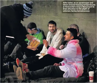  ??  ?? Alfie Usher, an ex paratroope­r and others braved freezing temperatur­es at Newcastle’s Grey’s Monument to draw attention to the plight of veterans facing homelessne­ss