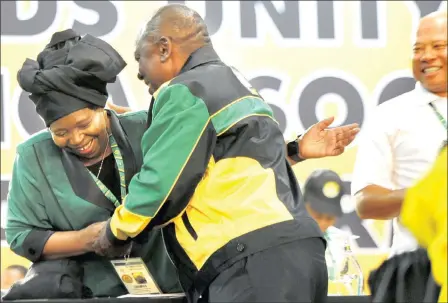  ?? PICTURE AYANDA NDAMANE/AFRICAN NEW AGENCY/ ANA ?? NO HARD FEELINGS: ANC presidenti­al hopefuls Cyril Ramaphosa and Nkosazana Dlamini Zuma share a light moment in the main hall at Nasrec where the governing party’s elective conference is taking place.