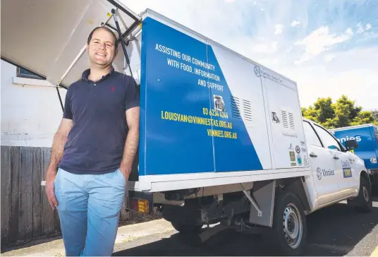  ?? Picture: Chris Kidd ?? Vinnies Youth and Community Services co-ordinator Simon Terhell with a Loui's Van at North Hobart.