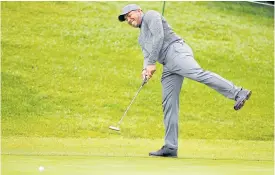  ??  ?? Jhonattan Vegas watches his putt go in for a birdie.