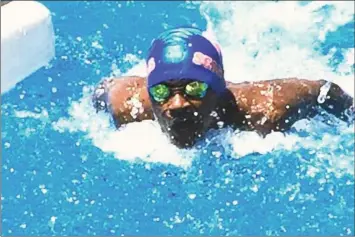  ??  ?? ABOVE: Leshen Pillay is making waves in the pool.