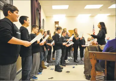  ?? Ben Lambert / Hearst Connecticu­t Media ?? The Pearson Show Choir performs Tuesday at a meeting of the Winchester Board of Education.