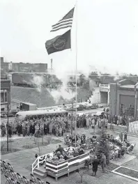  ??  ?? Mayor Watkins Overton spoke and a centennial flag fluttered from its staff as the Illinois Central Railroad celebrated its 100th anniversar­y in February 1951 with a program in Moews Park, just west of Central Station. The line was chartered on Feb. 10, 1851. JACK MEREDITH/THE COMMERCIAL APPEAL