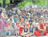  ?? RAVI KUMAR/HT PHOTO ?? Dera followers wait outside the CBI court in Panchkula on Friday.