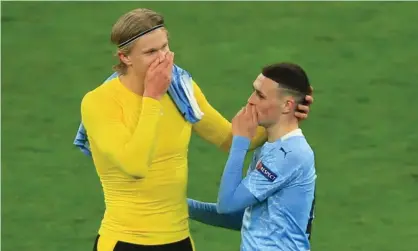  ?? ?? Erling Haaland (left) with Phil Foden after playing for Borussia Dortmund against Manchester City in April. Photograph: Wolfgang Rattay/Reuters