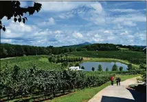  ?? COURTESY OF DAHLONEGA-LUMPKIN COUNTY CHAMBER & VISITORS BUREAU ?? Frogtown Cellars boasts striking views from its porches and decks.