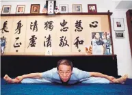  ?? MARVIN JOSEPH/ THE WASHINGTON POST ?? Jhoon Rhee does his morning workout at his home in McLean, Va., in 2002. The 10th-degree black belt routinely did 1,000 push-ups a day.