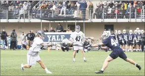 ?? Steve Musco / Yale Athletics ?? Yale’s Brian Tevlin takes a shot against Penn State earlier this season. Tevlin will miss the next few weeks as he undergoes a procedure to donate bone marrow after the Be the Match Registry identified him as a match for a patient in need.