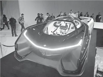  ?? ROBERT HANASHIRO, USA TODAY ?? Faraday Future, a new electric car company, unveiled a 1,000-hp racing prototype.