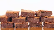  ?? DEB LINDSEY/THE WASHINGTON POST ?? Flourless brownies are an ideal CDV, aka Chocolate Delivery Vehicle, serving up robust fudgy flavor.