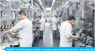  ?? — AFP ?? FRANKFURT AM MAIN: Industrial production in European powerhouse Germany fell back in June, official data showed yesterday, adding to the picture of a Eurozone suffering from trade wars and global uncertaint­y.