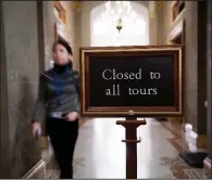  ?? The New York Times/ERIN SCHAFF ?? A corridor near the U.S. Senate chamber is closed off as the partial government shutdown continues. Museums and galleries at the nation’s capital will start closing in the middle of next week as funds run out.