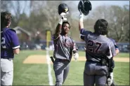  ?? OWEN MCCUE - MEDIANEWS GROUP ?? Pottsgrove’s Yasir Gardner-Sizer (5) is greeted at the plate after his first-inning homer Friday against Phoenixvil­le.