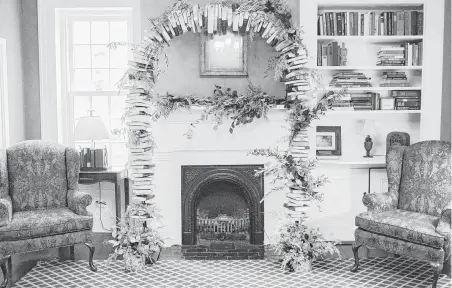  ?? Indsey Zern Photograph­y ?? Book arches are in demand, especially for weddings.