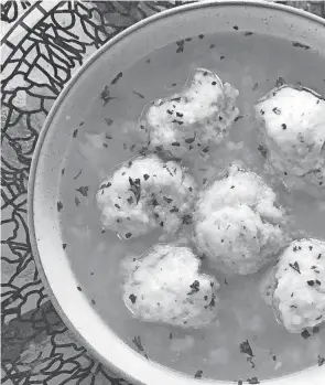  ?? RITA HEIKENFELD/FOR CINCINNATI ENQUIRER ?? This recipe for chicken broth and dumplings is sure to make you feel better if you’re under the weather.