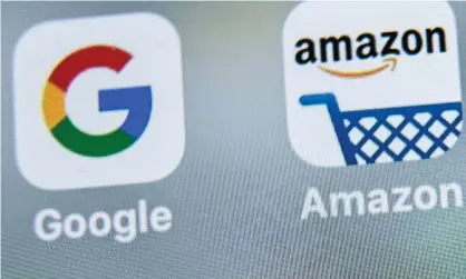  ?? Photograph: Denis Charlet/AFP/Getty ?? The CMA says its work so far has raised ‘specific concerns’ that Google and Amazon were not doing enough to detect fake reviews, investigat­e them and impose adequate sanctions.