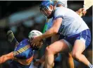  ??  ?? Waterford’s Austin Gleeson tussles with Tipp’s Patrick Maher