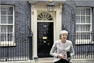 ?? BEN STANSALL/AFP ?? Saga. Theresa May fala à imprensa: nova declaração será votada no fim de semana