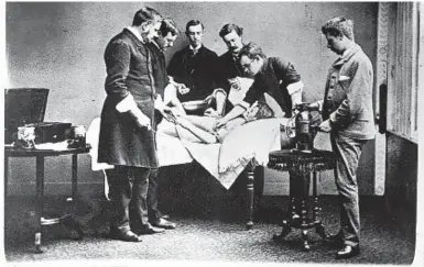  ??  ?? Surgeons work on a patient in Aberdeen in the 1860s. Doctors had just begun to spray equipment with antiseptic solutions. At this time, about 50% of hospital patients died due to infection after surgery. Doctors would not start wearing coats, gloves or...